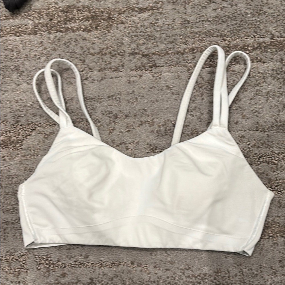 White Lulu sports bra size 4